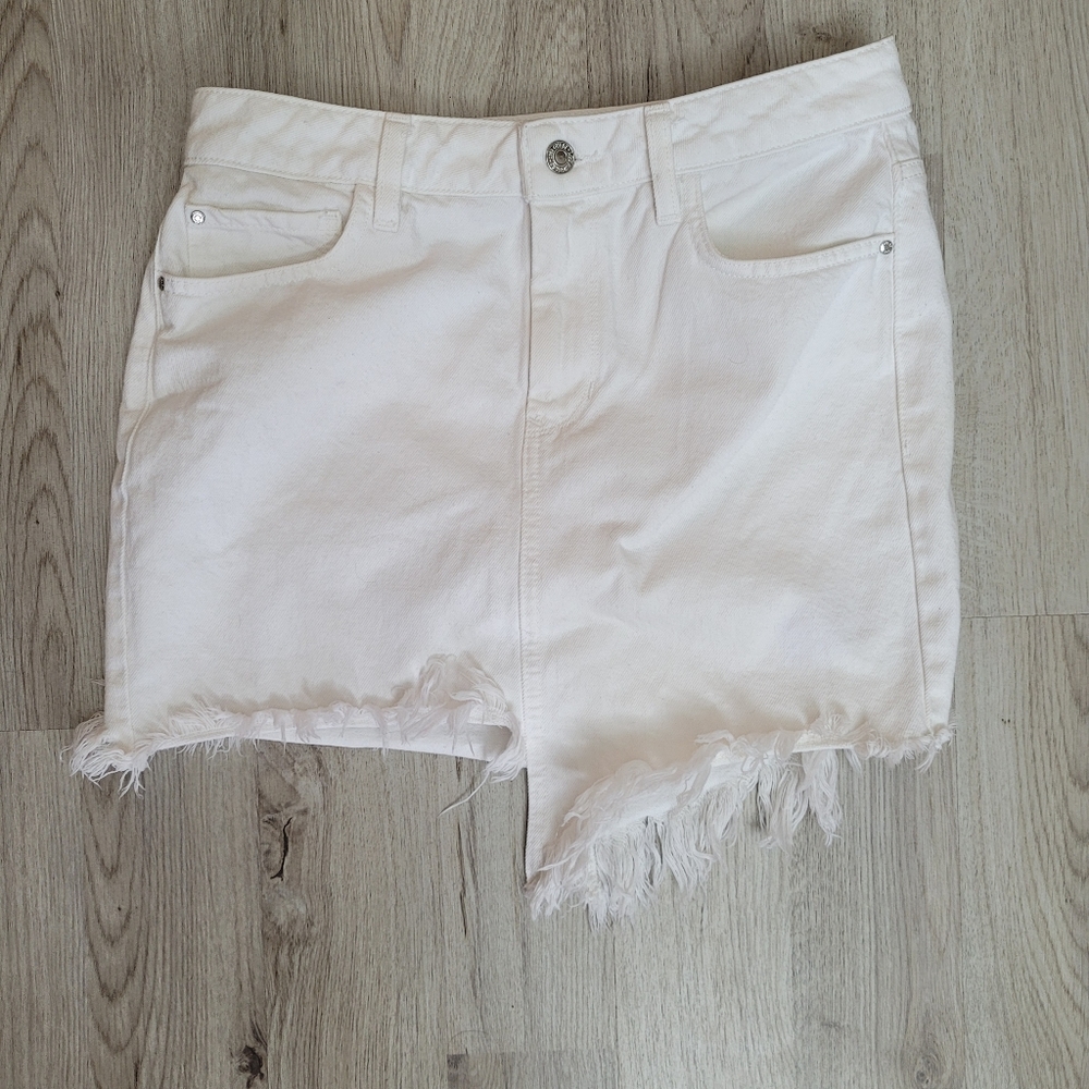 Guess Cute white mini asymmetrical skirt with fringe hem size small